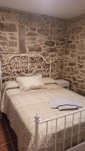 En eller flere senge i et værelse på Veiga da Porta - Casa Rural