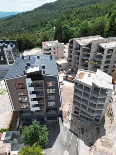 an aerial view of a city with buildings at Bjelašnica Vukov Vis 09 - apartment with a bedroom in Bjelašnica