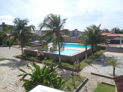 a view of the pool at a resort at Beach Hotel Jacuma in Jacumã