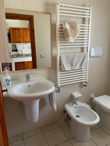 Ett badrum på Villetta 150mt dalla Spiaggia Flumini di Quartu