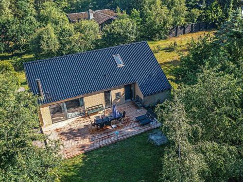 una vista aérea de una casa con techo en 10 person holiday home in V ggerl se, en Bøtø By