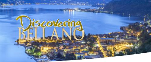 widok na miasto ze słowami Disneyland beeling w obiekcie La Casa Rosa by Roby&Silvy w mieście Bellano