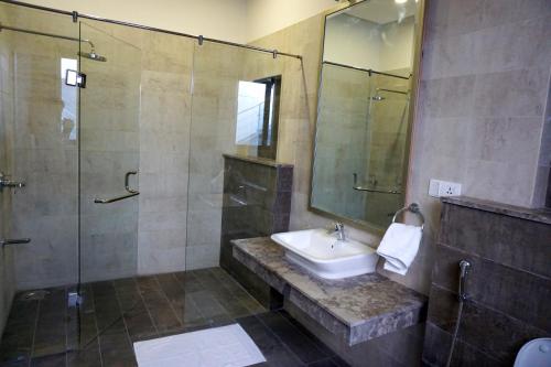 Ванная комната в OXVUE Boutique Hotel