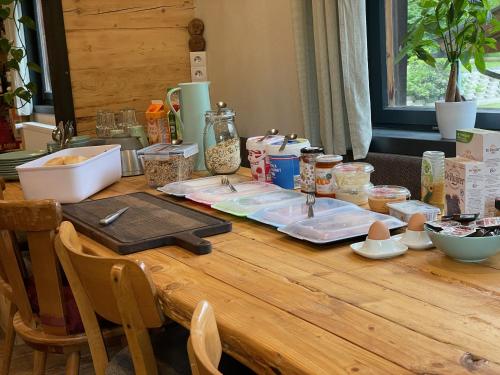 a wooden table with food on top of it at Backyard Mountain in Mayrhofen