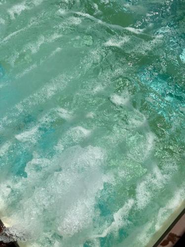 a pool of water with bubbles in it at Hotel Globus in Bellaria-Igea Marina