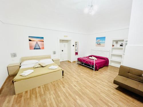 Posteľ alebo postele v izbe v ubytovaní La Casa del Barocco