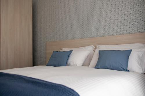 Cama o camas de una habitación en Dragonfly affittacamere
