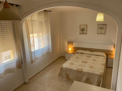 Postel nebo postele na pokoji v ubytování Precioso piso duplex en la Bahia de Cadiz para 5 plazas
