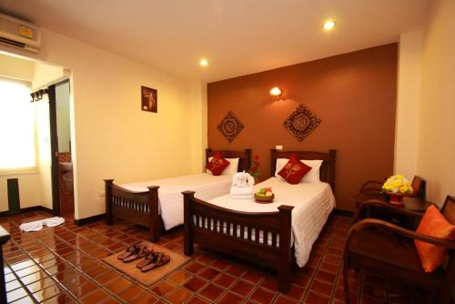 Imagen de la galería de CM Night Bazaar Boutique Hotel โรงแรม ซี เอ็ม ไนท์บาซาร์ บูทีค - SHA Plus Certified, en Chiang Mai