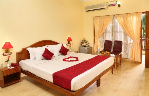 Ένα ή περισσότερα κρεβάτια σε δωμάτιο στο Jasmine Palace