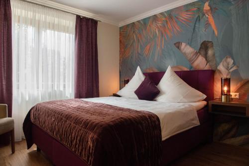 Postel nebo postele na pokoji v ubytování Boutique - Hotel Zum Schloss