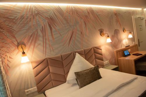 Postel nebo postele na pokoji v ubytování Boutique - Hotel Zum Schloss