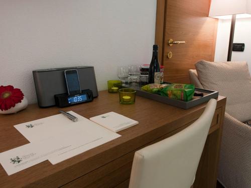 Televisyen dan/atau pusat hiburan di Hotel Principe delle Nevi