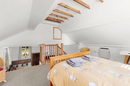 a bedroom with a large bed in a room at The Chapel in Humby