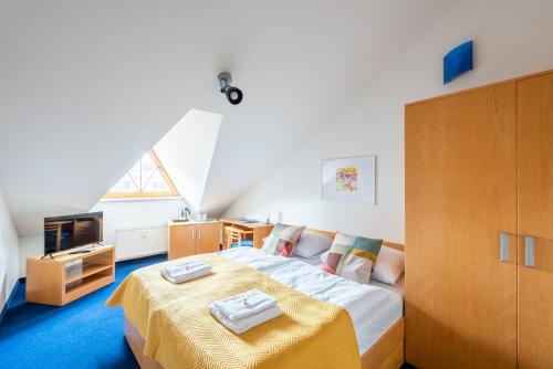 Postel nebo postele na pokoji v ubytování Libero Residence