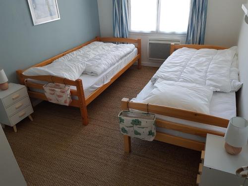 Postel nebo postele na pokoji v ubytování KEUR FOFO