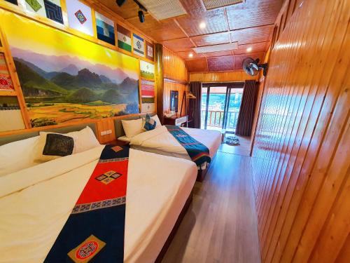 Postel nebo postele na pokoji v ubytování DONG VAN CLIFFSIDE HOUSE