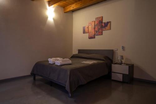 Postel nebo postele na pokoji v ubytování Via Cavour 19, Appartamento del Conte