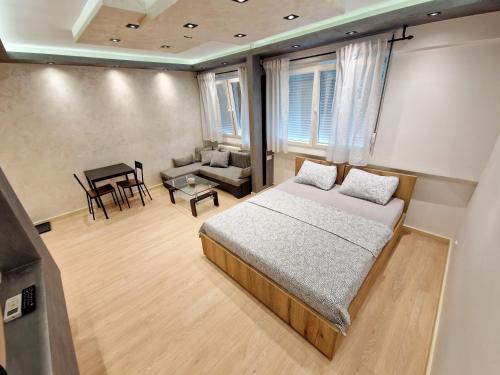 Postel nebo postele na pokoji v ubytování Apartmani Paku