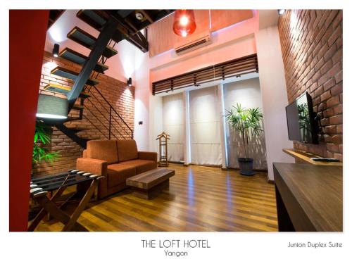 A seating area at The Loft Hotel Downtown Yangon