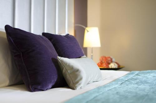 Cama o camas de una habitación en The Belgrave Hotel