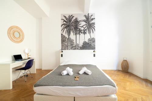 Posteľ alebo postele v izbe v ubytovaní Le Saint Firmin