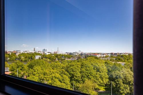 a view of a city from a window at Crowne Plaza Helsinki - Hesperia by IHG in Helsinki
