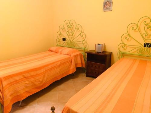 Postel nebo postele na pokoji v ubytování B&B Monte Acuto