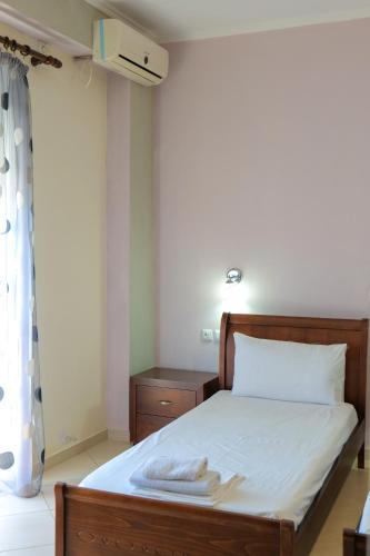 Katil atau katil-katil dalam bilik di Hotel Chris