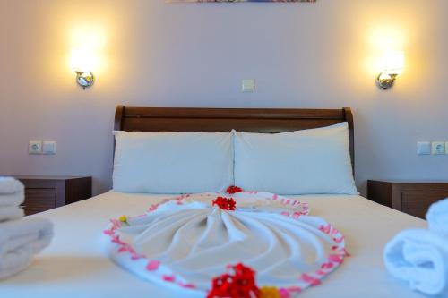 Katil atau katil-katil dalam bilik di Hotel Chris