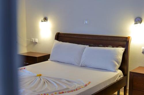 Katil atau katil-katil dalam bilik di Hotel Chris