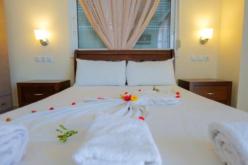 Katil atau katil-katil dalam bilik di Hotel Chris