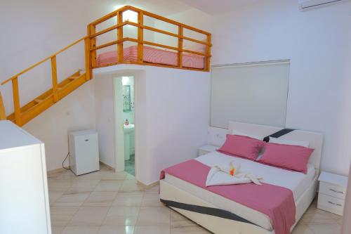 Katil atau katil-katil dalam bilik di Hotel Chris