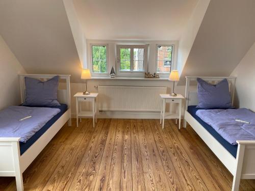 Ένα ή περισσότερα κρεβάτια σε δωμάτιο στο Das Föhs