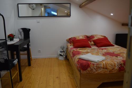 Ένα ή περισσότερα κρεβάτια σε δωμάτιο στο Appartement La Paix