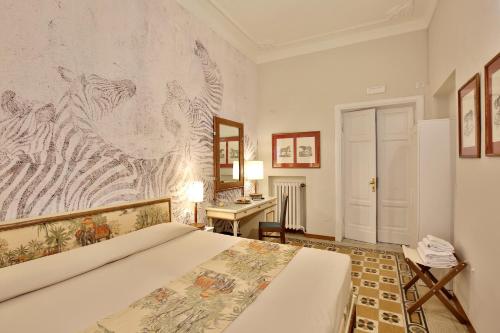 Кровать или кровати в номере MADAMA GUEST HOUSE