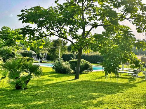 Jardín al aire libre en SU PASSU Country House