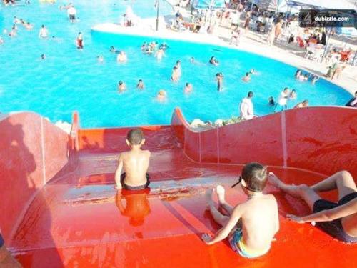 a group of people in a swimming pool at شاليه رائع مجدد للعائلات فقط باندلسيه مطروح in Marsa Matruh