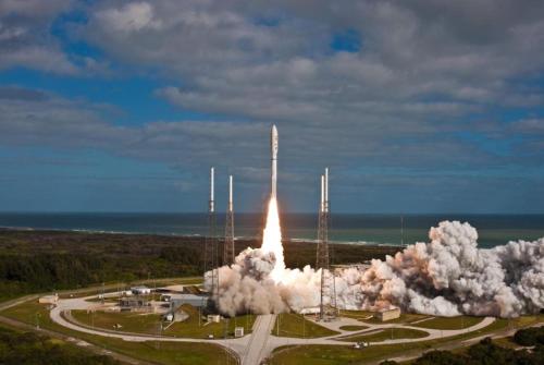 a missile lifts off from a field with smoke at Sunny Delight I in Cape Canaveral