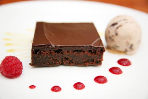 a piece of chocolate cake and a raspberry and ice cream at The View at the White Horse Woolley Moor in Clay Cross