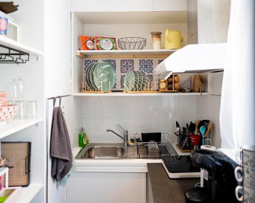 Cucina o angolo cottura di Warm Studio en duplex proche Paris et Disney