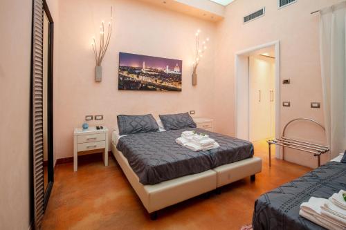Posteľ alebo postele v izbe v ubytovaní Aurora Garden Lodging - Rooms & Apartment