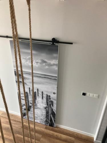 a room with a window with a view of the beach at Admiral Yacht in Świnoujście