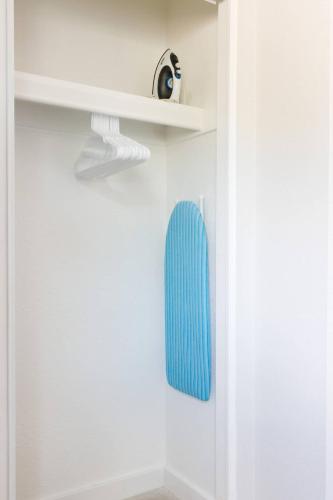 a blue object on a shelf in a room at LaRocco On Turney Biltmore in Phoenix