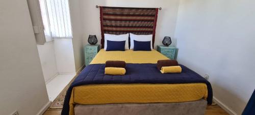 En eller flere senge i et værelse på Casas da Balsa