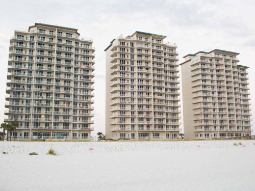 two large apartment buildings on the beach with snow at Summerwinds #204 in Navarre