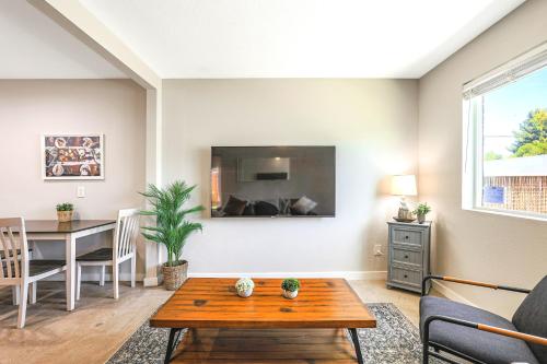 a living room with a couch and a table at LaRocco On Turney Biltmore in Phoenix