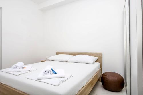 Posteľ alebo postele v izbe v ubytovaní Apartments Verdina
