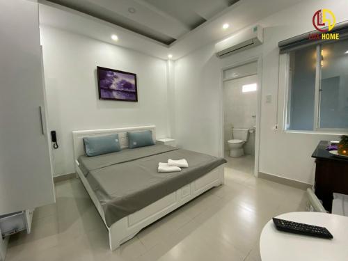 Ένα ή περισσότερα κρεβάτια σε δωμάτιο στο VANAPARTMENT