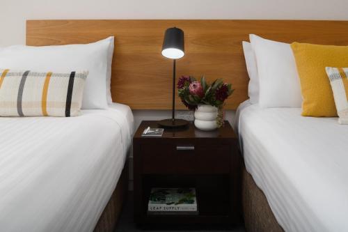 Ένα ή περισσότερα κρεβάτια σε δωμάτιο στο Rydges Bankstown